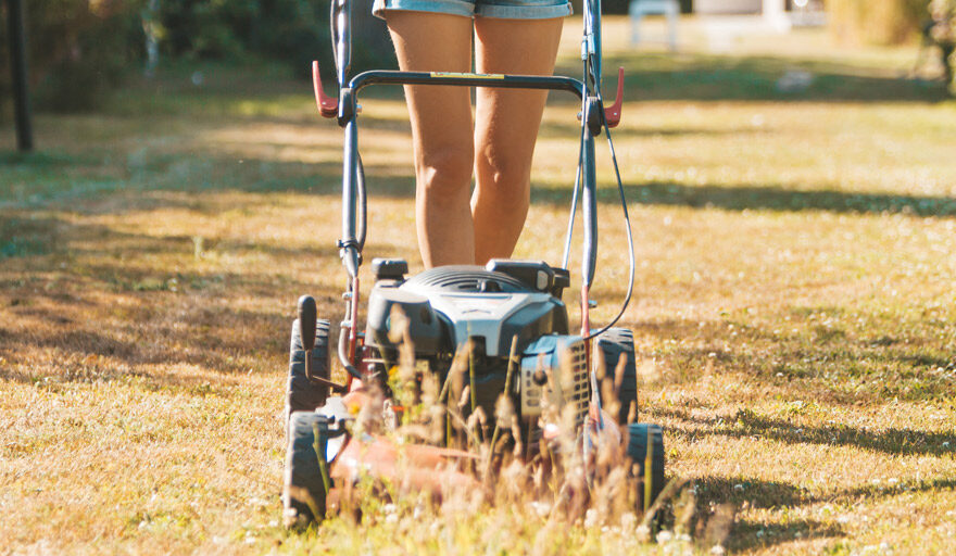 Person mowing lawn