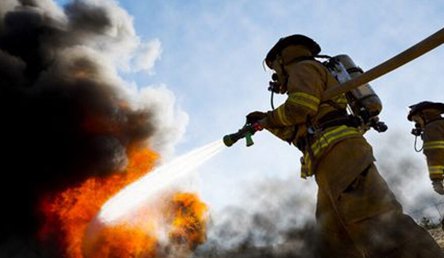 Firefighting putting out a fire